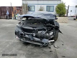 2024 BMW i5 eDrive40 with VIN WBY33FK03RCR93119, listed as a Copart auction lot 76124194 with 0 mi miles and Salvage Title. Bid and sale history available at carsss.com. Image 11.