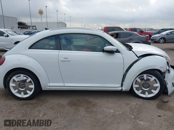 2019 Volkswagen Beetle S with VIN 3VWFD7AT2KM701622, listed as a IAAI auction lot 41520300 with Not provided miles and . Bid and sale history available at DreamBid. Image 14.