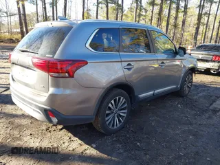 2020 Mitsubishi Outlander ES with VIN JA4AZ3A31LZ041204, listed as a IAAI auction lot 41265645 with 98,372 mi miles and . Bid and sale history available at DreamBid. Image 4.