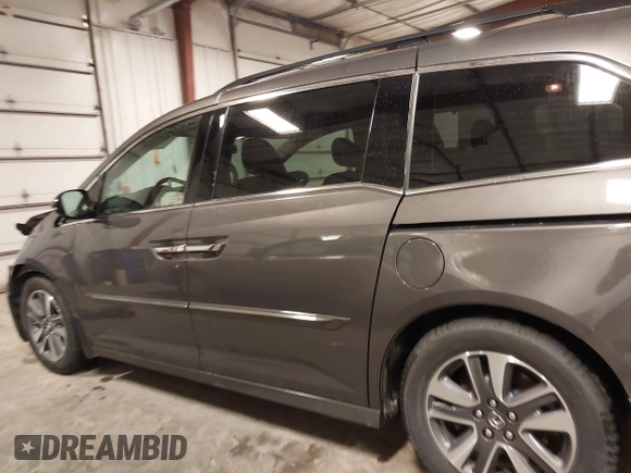 2016 Honda Odyssey Touring Elite with VIN 5FNRL5H92GB045824, listed as a IAAI auction lot 41872220 with 120,557 mi miles. Bid and sale history available at carsss.com. Image 15.