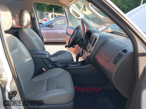 2006 Ford Escape XLT with VIN 1FMYU93156KD26045, listed as a IAAI auction lot 42503718 with 141,738 mi miles and . Bid and sale history available at DreamBid. Image 5.