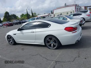 2013 BMW M6 z VIN WBSLX9C50DC968892, wystawiony jako IAAI lot #41935486 z przebiegiem 105 736 mil mil oraz . Historia ofert i sprzedaży dostępna na DreamBid. Obrazek 14.