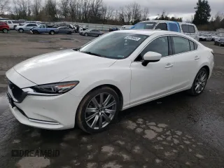 2021 Mazda 6 Signature with VIN JM1GL1XY9M1606002, listed as a Copart auction lot 45196463 with 34,248 mi miles and . Bid and sale history available at DreamBid. Image 1.