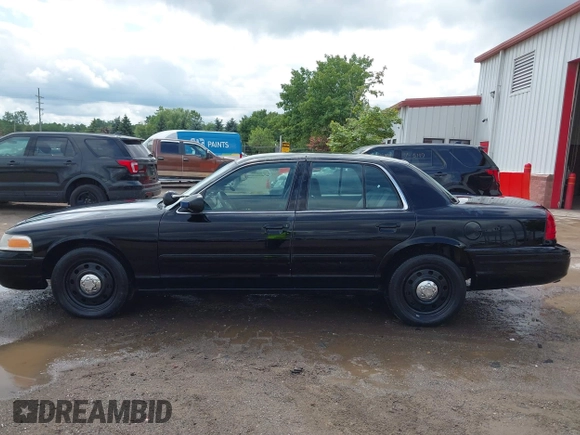 2005 Ford Police Interceptor z VIN 2FAHP71WX5X154384, wystawiony jako IAAI lot #40735796 z przebiegiem 84 143 mil mil oraz . Historia ofert i sprzedaży dostępna na DreamBid. Obrazek 14.