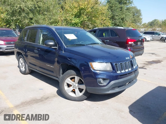 2014 Jeep Compass Sport with VIN 1C4NJCBB0ED660610, listed as a IAAI auction lot 40506737 with 209,670 mi miles. Bid and sale history available at carsss.com. Image 1.
