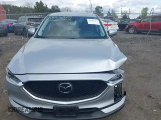 2021 Mazda CX-5 Grand Touring with VIN JM3KFBDM3M0354348, listed as a IAAI auction lot 41924207 with 45,786 mi miles. Bid and sale history available at carsss.com. Image 12.