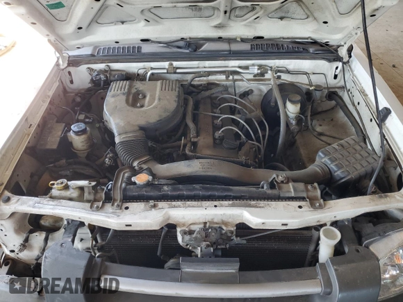 2002 Nissan Frontier XE with VIN 1N6DD26S02C309301, listed as a Copart auction lot 64142805 with 237,523 mi miles and Salvage title. Bid and sale history available at DreamBid. Image 11.