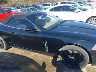 2007 Jaguar XK with VIN SAJDA44B975B01444, listed as a IAAI auction lot 41606094 with 155,227 mi miles. Bid and sale history available at carsss.com. Image 13.