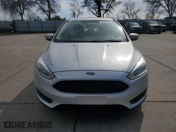 2018 Ford Focus SE with VIN 1FADP3FE3JL261145, listed as a Copart auction lot 47411315 with 98,581 mi miles and Salvage Title. Bid and sale history available at carsss.com. Image 5.