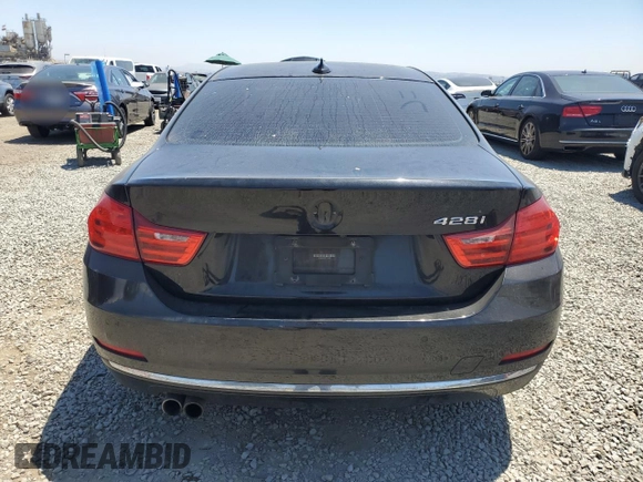 2014 BMW 4 Series 428i with VIN WBA3N3C57EF712370, listed as a Copart auction lot 63108215 with 151,779 mi miles and Salvage title. Bid and sale history available at DreamBid. Image 6.