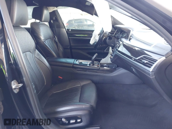 2019 BMW 7 Series 740i with VIN WBA7E2C58KB218419, listed as a IAAI auction lot 41831080 with 97,752 mi miles and . Bid and sale history available at DreamBid. Image 5.