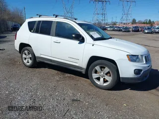 2016 Jeep Compass Sport with VIN 1C4NJDBB6GD647367, listed as a IAAI auction lot 41818920 with 169,037 mi miles and . Bid and sale history available at carsss.com. Image 1.