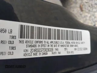 2012 Dodge Grand Caravan SXT with VIN 2C4RDGCG7CR236328, listed as a IAAI auction lot 42170991 with 72,831 mi miles and . Bid and sale history available at DreamBid. Image 9.
