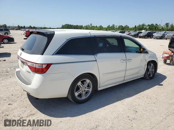 2013 Honda Odyssey Touring with VIN 5FNRL5H94DB021388, listed as a Copart auction lot 52582775 with 141,566 mi miles and Salvage Title. Bid and sale history available at carsss.com. Image 3.