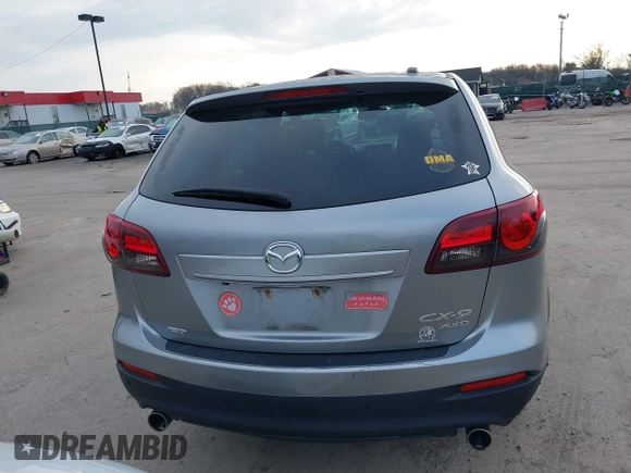2013 Mazda CX-9 Grand Touring z VIN JM3TB3DV1D0401102, wystawiony jako IAAI lot #41248346 z przebiegiem 122 555 mil mil oraz . Historia ofert i sprzedaży dostępna na DreamBid. Obrazek 16.