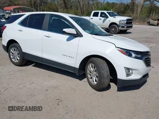 2021 Chevrolet Equinox LT z VIN 2GNAXKEV1M6112164, wystawiony jako IAAI lot #41897731 z przebiegiem 63 300 mil mil oraz . Historia ofert i sprzedaży dostępna na DreamBid. Obrazek 1.
