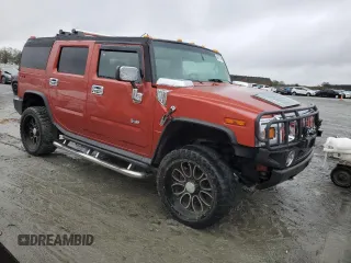 2003 Hummer H2 with VIN 5GRGN23U33H136931, listed as a Copart auction lot 80671794 with 127,137 mi miles and Salvage Title. Bid and sale history available at carsss.com. Image 4.
