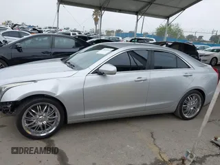 2013 Cadillac ATS Luxury z VIN 1G6AB5RX9D0156834, wystawiony jako IAAI lot #41870392 z przebiegiem 60 952 mil mil oraz . Historia ofert i sprzedaży dostępna na DreamBid. Obrazek 15.