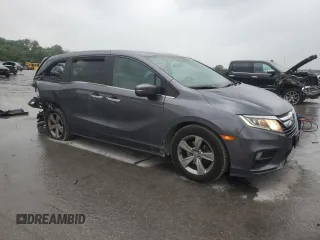 2018 Honda Odyssey EX with VIN 5FNRL6H50JB047999, listed as a Copart auction lot 57819495 with 121,295 mi miles and Salvage title. Bid and sale history available at DreamBid. Image 4.