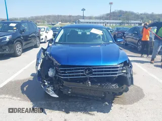 2017 Volkswagen Passat 1.8T SE with VIN 1VWBT7A31HC021299, listed as a IAAI auction lot 41961686 with 135,912 mi miles. Bid and sale history available at carsss.com. Image 13.