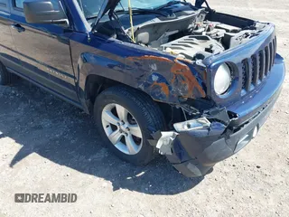 2014 Jeep Patriot Latitude with VIN 1C4NJRFB0ED760607, listed as a IAAI auction lot 41846134 with 136,041 mi miles. Bid and sale history available at carsss.com. Image 6.