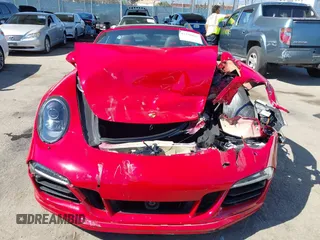 2016 Porsche 911 4S z VIN WP0BB2A99GS136573, wystawiony jako IAAI lot #42238845 z przebiegiem 13 464 mil mil oraz . Historia ofert i sprzedaży dostępna na DreamBid. Obrazek 12.