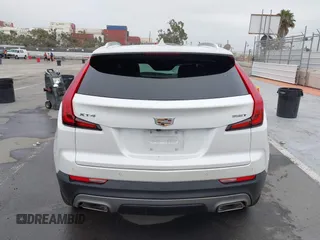 2022 Cadillac XT4 FWD Premium Luxury with VIN 1GYFZCR49NF100393, listed as a IAAI auction lot 42497187 with 23,672 mi miles and . Bid and sale history available at DreamBid. Image 16.