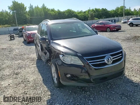 2010 Volkswagen Tiguan Wolfsburg Edition z VIN WVGAV7AX2AW527803, wystawiony jako Copart lot #55920475 z przebiegiem 107 682 mil mil oraz Szkoda całkowita • Salvage title. Historia ofert i sprzedaży dostępna na DreamBid. Obrazek 14.