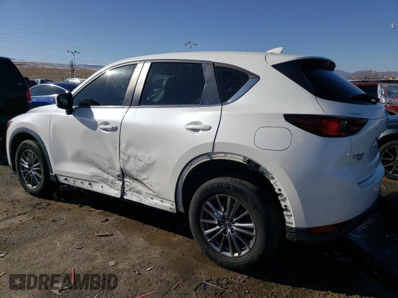 2017 Mazda CX-5 Sport with VIN JM3KFBBL2H0125756, listed as a Copart auction lot 42834725 with 81,433 mi miles and Salvage Title. Bid and sale history available at carsss.com. Image 2.