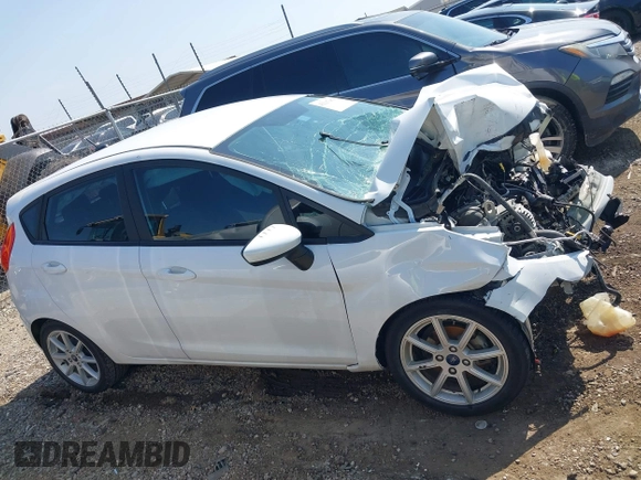 2019 Ford Fiesta SE с VIN 3FADP4EJ1KM144362, выставлен на аукционе IAAI как лот 42217469 с пробегом 40 772 миль миль и . История ставок и продаж доступна на DreamBid. Изображение 14.