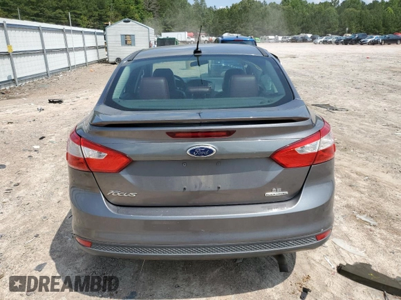 2013 Ford Focus SE z VIN 1FADP3F26DL344904, wystawiony jako Copart lot #59965505 z przebiegiem 162 202 mil mil oraz Czysty tytuł • Clean title. Historia ofert i sprzedaży dostępna na DreamBid. Obrazek 6.