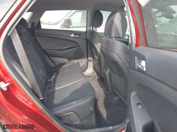 2019 Hyundai Tucson Value with VIN KM8J33A42KU861329, listed as a IAAI auction lot 41679185 with 65,304 mi miles. Bid and sale history available at carsss.com. Image 8.