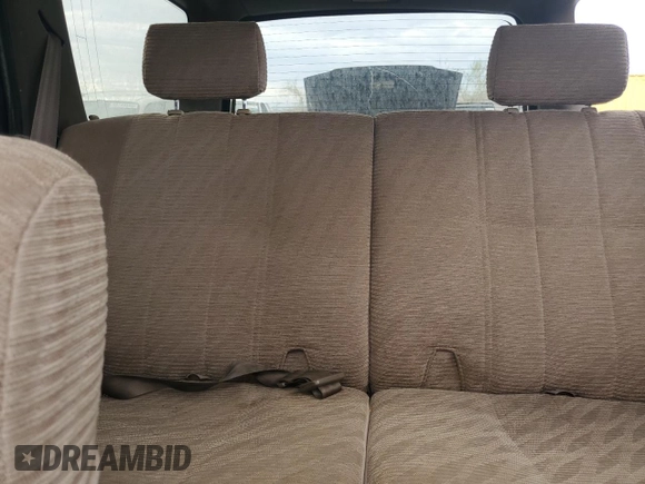 1997 Toyota 4Runner SR5 z VIN JT3HN86R9V0059388, wystawiony jako Copart lot #59231815 z przebiegiem 310 270 mil mil oraz Szkoda całkowita • Salvage title. Historia ofert i sprzedaży dostępna na DreamBid. Obrazek 10.