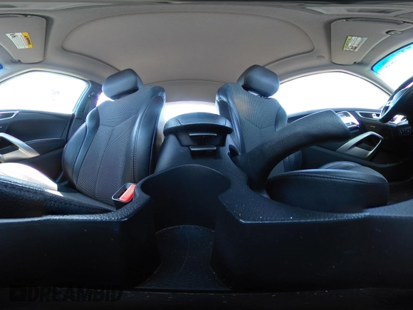 2013 Hyundai Veloster w/Black Int with VIN KMHTC6AD6DU143974, listed as a IAAI auction lot 42164745 with 136,195 mi miles and . Bid and sale history available at DreamBid. Image 18.