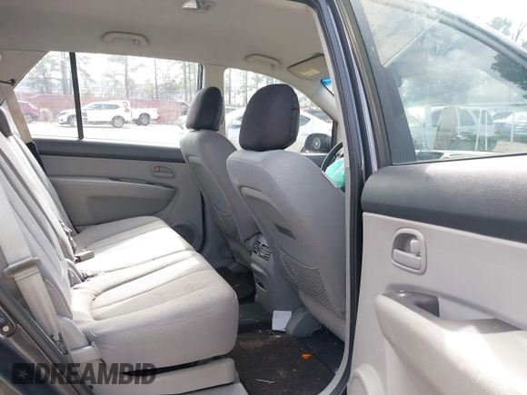 2008 Kia Rondo LX with VIN KNAFG526787176905, listed as a IAAI auction lot 41311694 with 161,161 mi miles. Bid and sale history available at carsss.com. Image 8.