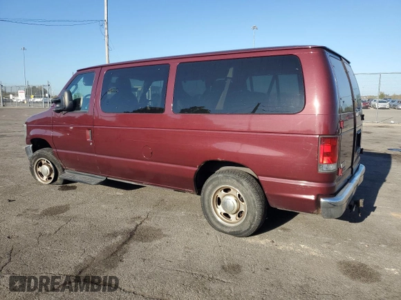2010 Ford Econoline Passenger XL with VIN 1FMNE1BW6ADA87472, listed as a Copart auction lot 74989314 with 215,315 mi miles and Salvage Title. Bid and sale history available at DreamBid. Image 2.
