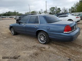 2009 Ford Crown Victoria LX with VIN 2FAHP74V79X124042, listed as a Copart auction lot 50974145 with 115,223 mi miles and Salvage Title. Bid and sale history available at carsss.com. Image 2.