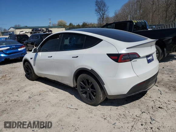 2022 Tesla Model Y Long Range with VIN 7SAYGDEE7NA012634, listed as a Copart auction lot 49206295 with 19,267 mi miles and Clean Title. Bid and sale history available at DreamBid. Image 2.