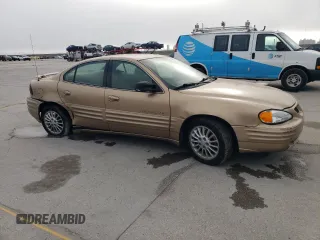 1999 Pontiac Grand Am SE2 with VIN 1G2NE52T2XM869508, listed as a Copart auction lot 44443755 with 119,769 mi miles and Salvage Title. Bid and sale history available at carsss.com. Image 4.