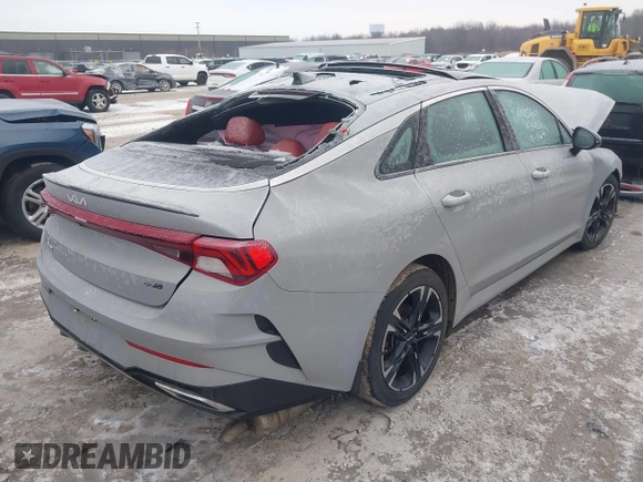2022 Kia K5 GT-Line z VIN 5XXG64J24NG124900, wystawiony jako IAAI lot #41547846 z przebiegiem 104 024 mil mil oraz . Historia ofert i sprzedaży dostępna na DreamBid. Obrazek 4.