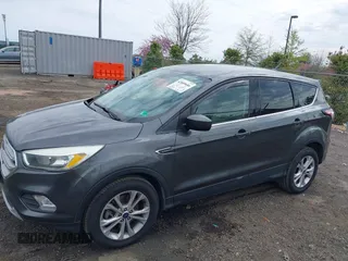 2017 Ford Escape SE with VIN 1FMCU9GD1HUC27843, listed as a IAAI auction lot 42009686 with 111,290 mi miles and . Bid and sale history available at DreamBid. Image 14.