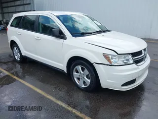 2014 Dodge Journey SE with VIN 3C4PDCAB2ET123457, listed as a IAAI auction lot 42739277 with 141,777 mi miles and . Bid and sale history available at DreamBid. Image 1.