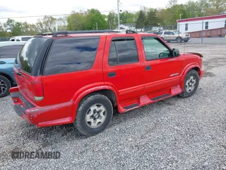 2004 Chevrolet Blazer LS z VIN 1GNDT13X64K127182, wystawiony jako IAAI lot #42188177 z przebiegiem 135 946 mil mil oraz . Historia ofert i sprzedaży dostępna na DreamBid. Obrazek 4.