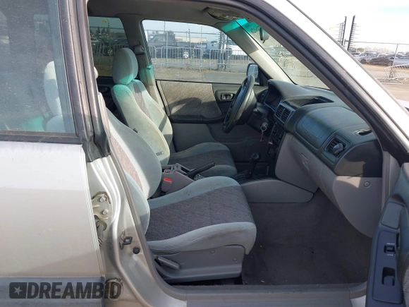 2000 Subaru Forester L with VIN JF1SF6355YH721788, listed as a IAAI auction lot 41736026 with 305,157 mi miles. Bid and sale history available at carsss.com. Image 5.