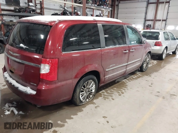 2011 Chrysler Town & Country Limited with VIN 2A4RR6DG6BR610723, listed as a IAAI auction lot 41618665 with 165,993 mi miles. Bid and sale history available at carsss.com. Image 4.