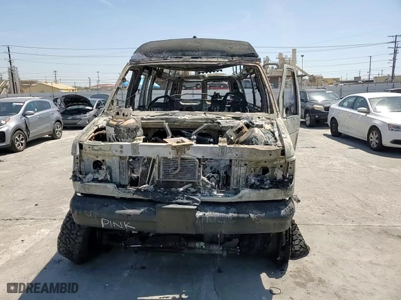 2001 Ford Econoline Wagon XL with VIN 1FBSS31F81HB74851, listed as a Copart auction lot 52738635 with 0 mi miles and Non Repairable. Bid and sale history available at carsss.com. Image 12.