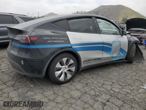 2024 Tesla Model Y Long Range with VIN 7SAYGDEE8RA238798, listed as a Copart auction lot 54401175 with Not provided miles and Salvage title. Bid and sale history available at DreamBid. Image 3.