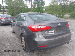 2014 Kia Forte EX with VIN KNAFX4A82E5086095, listed as a IAAI auction lot 42118745 with 151,040 mi miles. Bid and sale history available at carsss.com. Image 3.