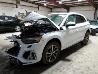 2023 Audi Q5 S line Prestige z VIN WA1FAAFY7P2165319, wystawiony jako Copart lot #83750474 z przebiegiem Nie podano mil oraz Szkoda całkowita • Salvage title. Historia ofert i sprzedaży dostępna na DreamBid. Obrazek 1.
