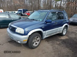 2003 Suzuki Grand Vitara z VIN JS3TD62V534105807, wystawiony jako IAAI lot #41662214 z przebiegiem 111 087 mil mil oraz . Historia ofert i sprzedaży dostępna na DreamBid. Obrazek 2.